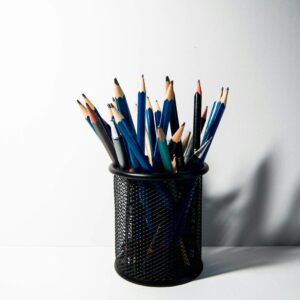 Black mesh pen holder cup
