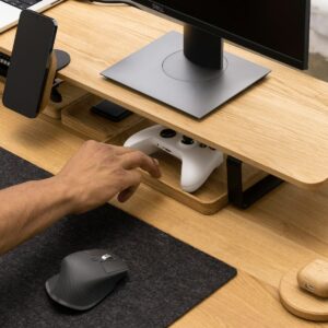 Wooden monitor stand riser on desk